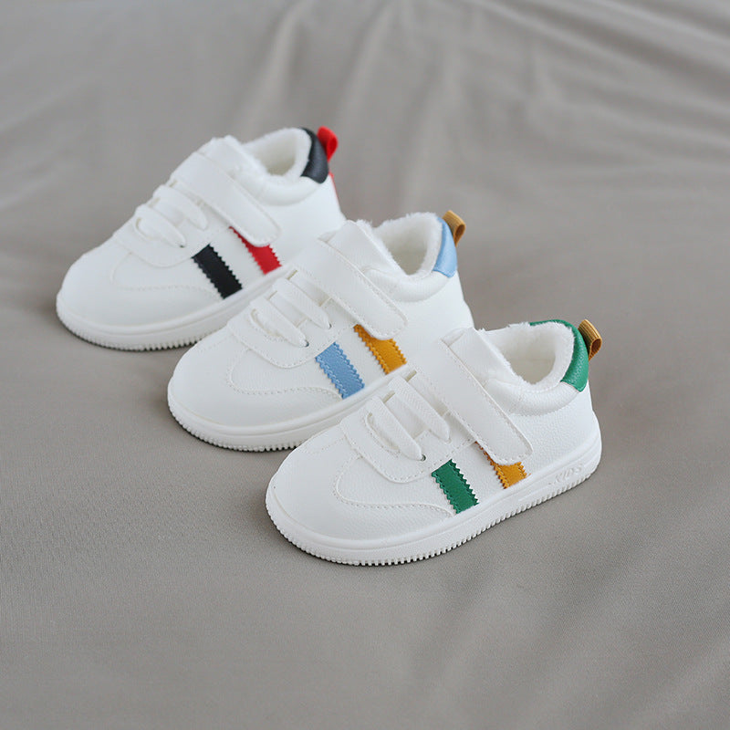 Little white Velcro baby shoes