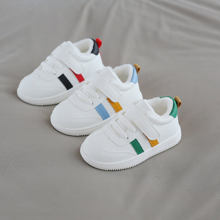 Little white Velcro baby shoes